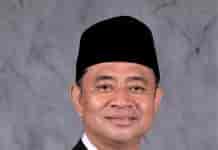 Muslim, S.Sos., M.Si.